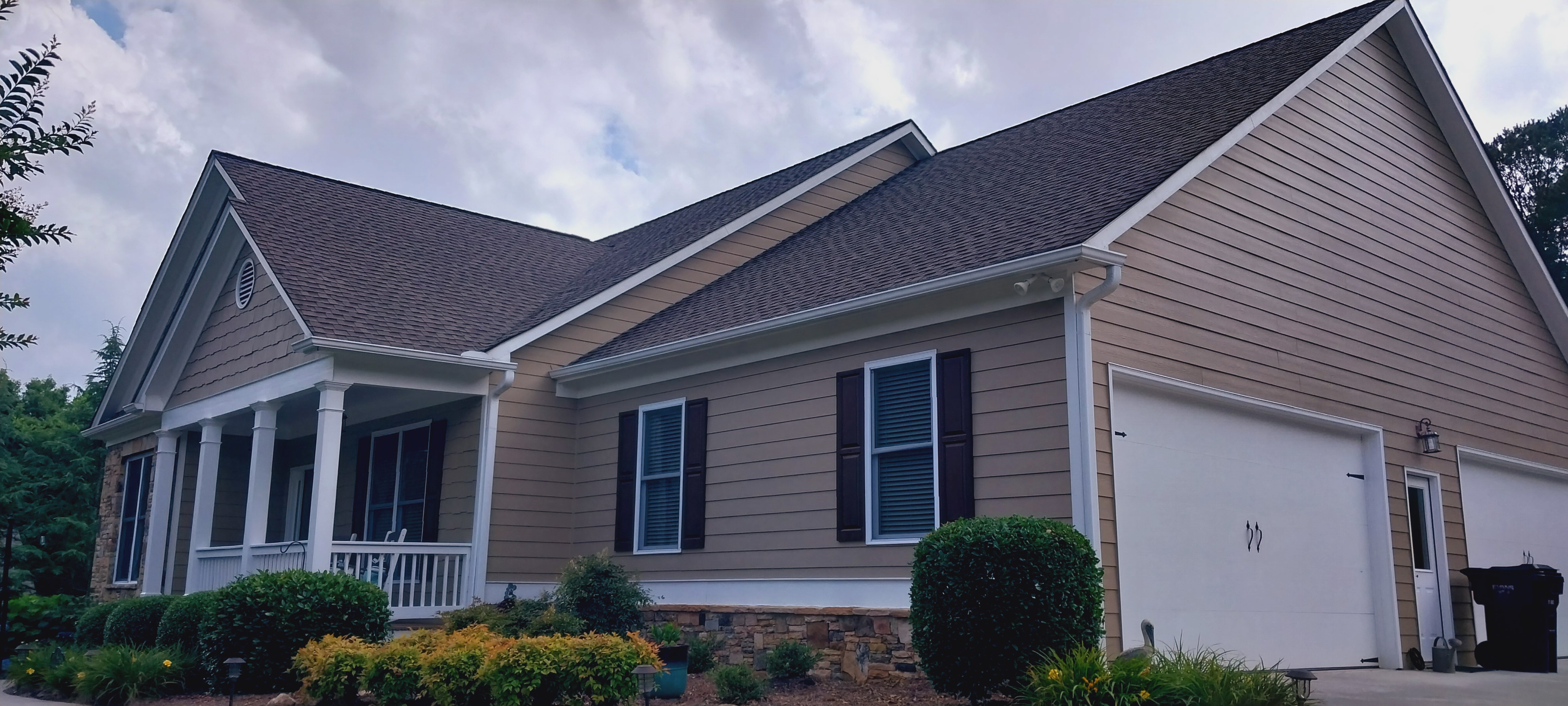 HOMEOWNERS ARE VERY HAPPY WITH THEIR LIKE NEW ROOF AFTER A ROOF CLEANING. DAWSONVILLE, GA