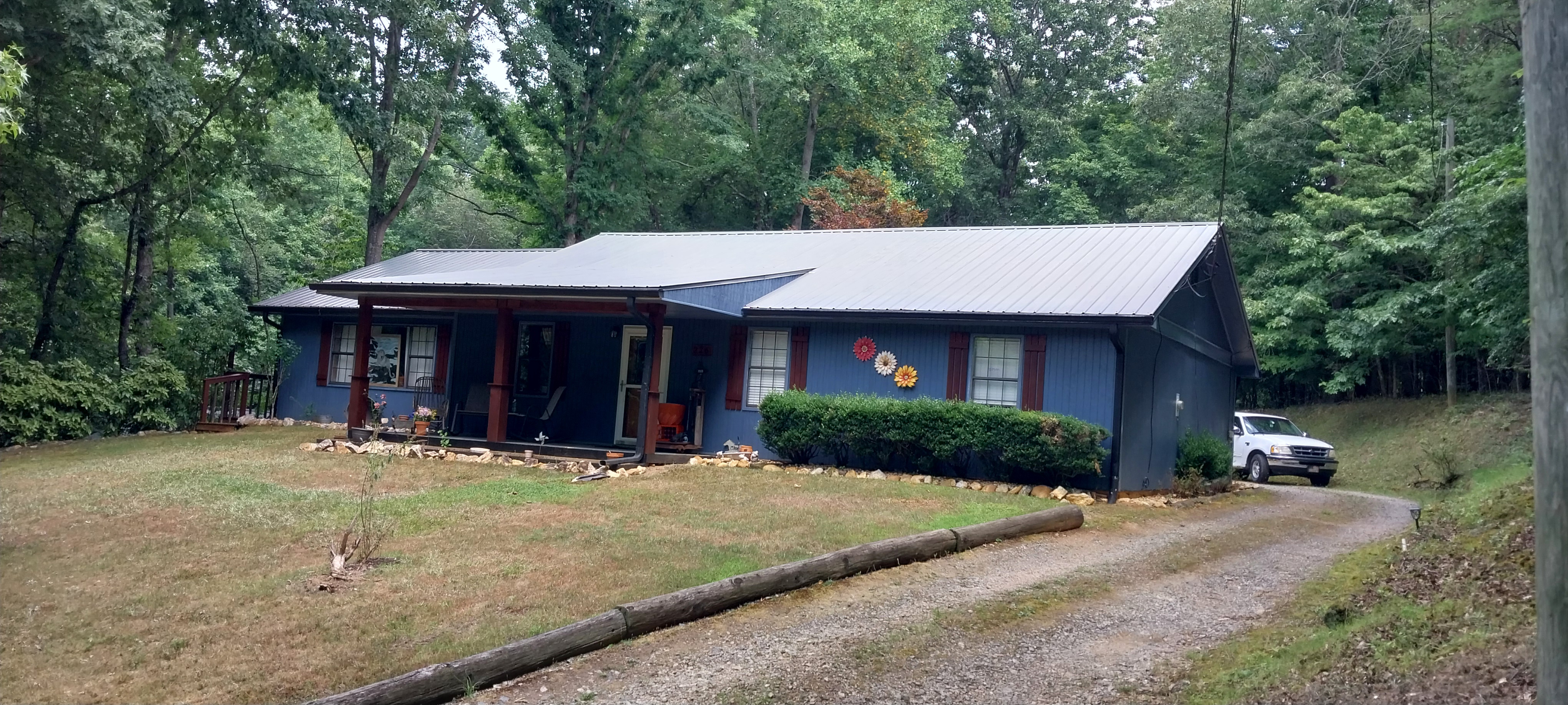 THIS HOME IN DAWSONVILLE, GA RECEIVED OUR METAL ROOF CLEANING SERVICE